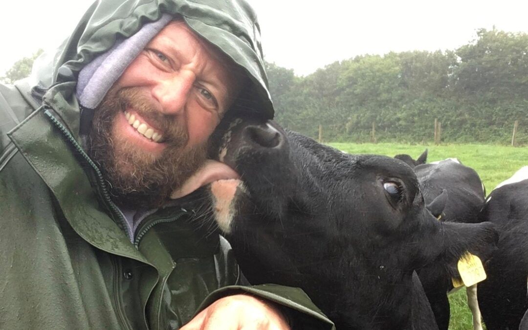 dairy farmer with cow