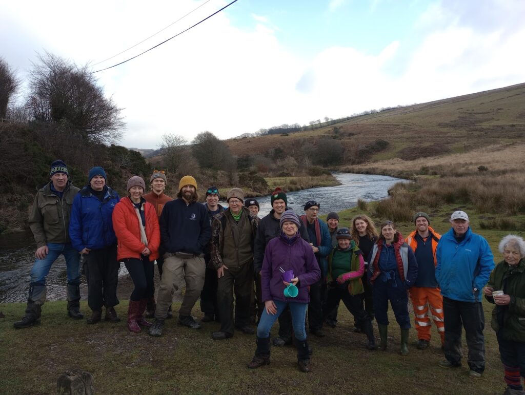 Volunteers planting trees at Landacre Bridge